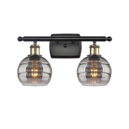 A large image of the Innovations Lighting 516-2W-9-16 Rochester Vanity Black Antique Brass / Light Smoke