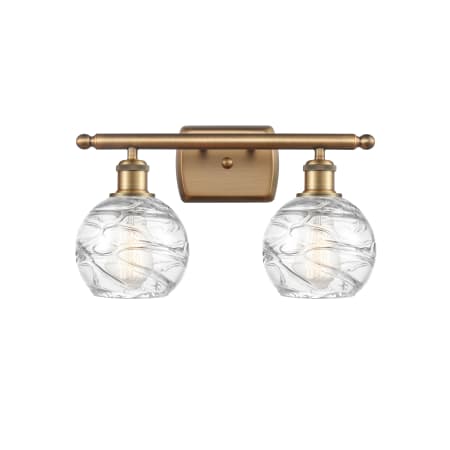 A large image of the Innovations Lighting 516-2W Small Deco Swirl Brushed Brass / Clear