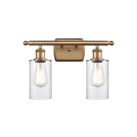 A large image of the Innovations Lighting 516-2W-12-16 Clymer Vanity Clear / Brushed Brass