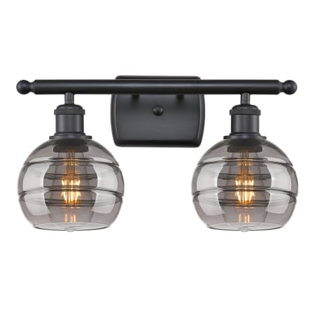 A large image of the Innovations Lighting 516-2W-9-16 Rochester Vanity Matte Black / Light Smoke