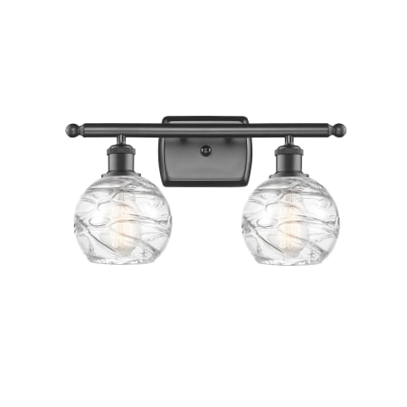 A large image of the Innovations Lighting 516-2W Small Deco Swirl Oil Rubbed Bronze / Clear