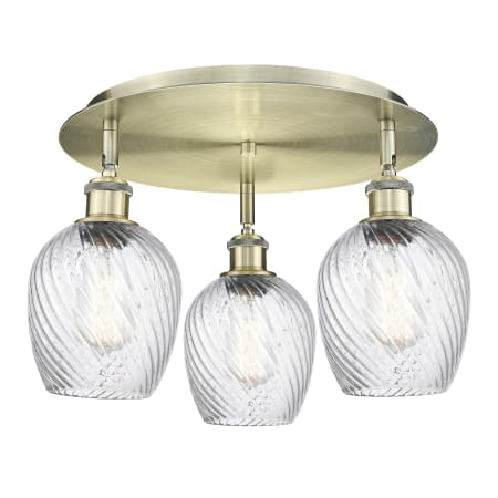A large image of the Innovations Lighting 516-3C-10-17 Salina Flush Antique Brass / Clear Spiral Fluted