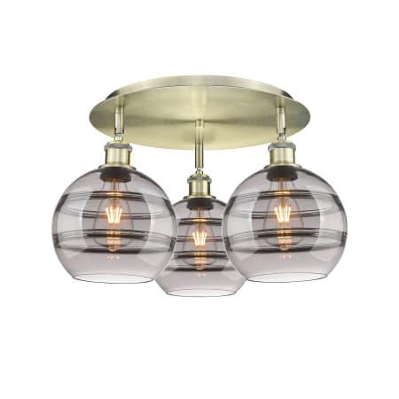 A large image of the Innovations Lighting 516-3C-11-20 Rochester Flush Antique Brass / Light Smoke