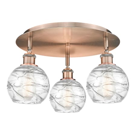 A large image of the Innovations Lighting 516-3C-9-18 Athens Deco Swirl Flush Antique Copper / Clear Deco Swirl