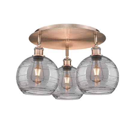 A large image of the Innovations Lighting 516-3C 11 20 Athens Deco Swirl Semi-Flush Antique Copper / Light Smoke Deco Swirl