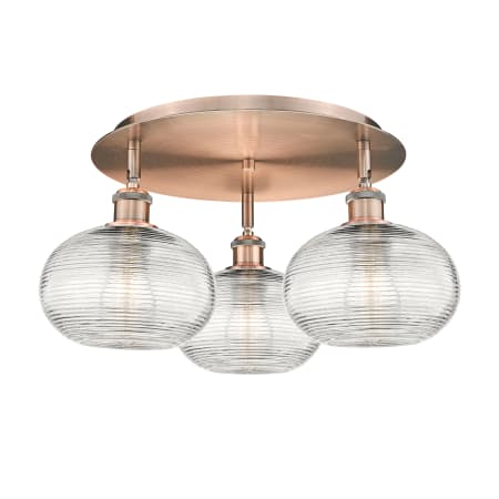 A large image of the Innovations Lighting 516-3C-10-20 Ithaca Flush Antique Copper / Clear Ithaca