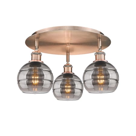 A large image of the Innovations Lighting 516-3C-9-18 Rochester Flush Antique Copper / Light Smoke