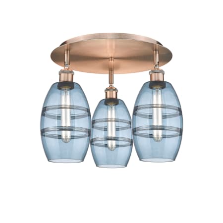 A large image of the Innovations Lighting 516-3C-9-18 Vaz Flush Antique Copper / Blue