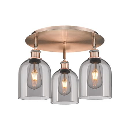 A large image of the Innovations Lighting 516-3C-11-18 Bella Flush Antique Copper / Light Smoke