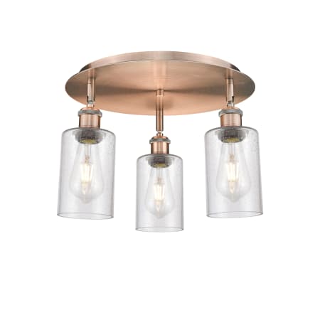 A large image of the Innovations Lighting 516-3C-10-16 Clymer Flush Antique Copper / Seedy