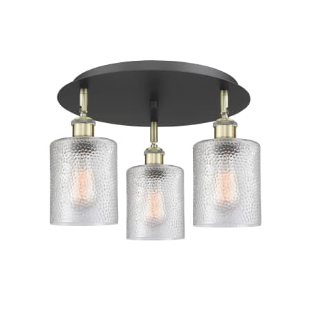 A large image of the Innovations Lighting 516-3C-10-18 Cobbleskill Flush Black Antique Brass / Clear