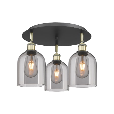 A large image of the Innovations Lighting 516-3C-11-18 Bella Flush Black Antique Brass / Light Smoke