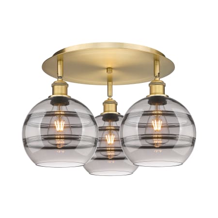 A large image of the Innovations Lighting 516-3C-11-20 Rochester Flush Brushed Brass / Light Smoke