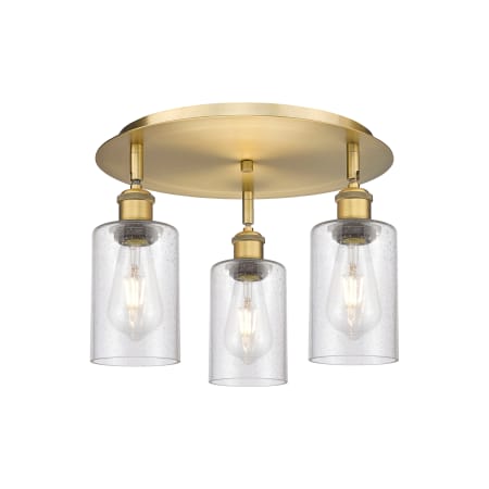 A large image of the Innovations Lighting 516-3C-10-16 Clymer Flush Brushed Brass / Seedy