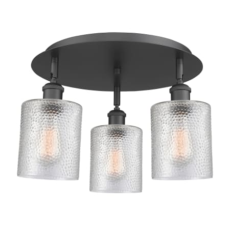 A large image of the Innovations Lighting 516-3C-10-18 Cobbleskill Flush Matte Black / Clear