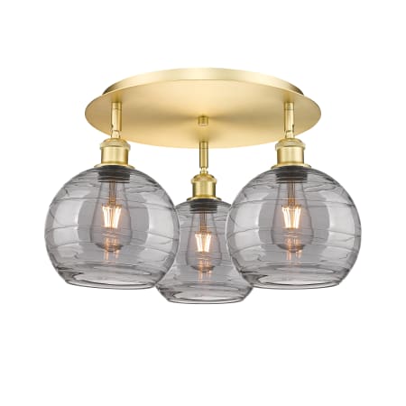 A large image of the Innovations Lighting 516-3C 11 20 Athens Deco Swirl Semi-Flush Satin Gold / Light Smoke Deco Swirl