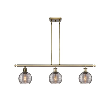 A large image of the Innovations Lighting 516-3I 9 36 Athens Deco Swirl Chandelier Antique Brass / Light Smoke Deco Swirl