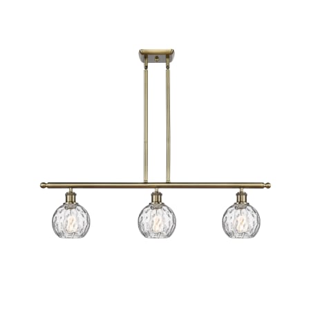 A large image of the Innovations Lighting 516-3I-9-36 Athens Linear Antique Brass / Clear Water Glass