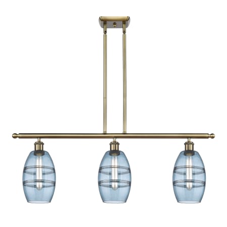 A large image of the Innovations Lighting 516-3I-9-36 Vaz Linear Antique Brass / Blue