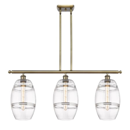 A large image of the Innovations Lighting 516-3I-10-36 Vaz Linear Antique Brass / Clear