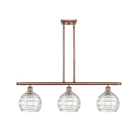 A large image of the Innovations Lighting 516-3I-11-36 Athens Linear Clear Deco Swirl / Antique Copper