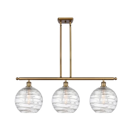 A large image of the Innovations Lighting 516-3I-13-37 Athens Linear Brushed Brass / Clear Deco Swirl