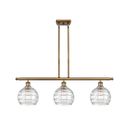 A large image of the Innovations Lighting 516-3I-11-36 Athens Linear Clear Deco Swirl / Brushed Brass