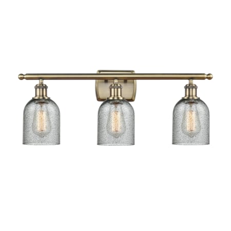 A large image of the Innovations Lighting 516-3W-12-26 Caledonia Vanity Charcoal / Antique Brass