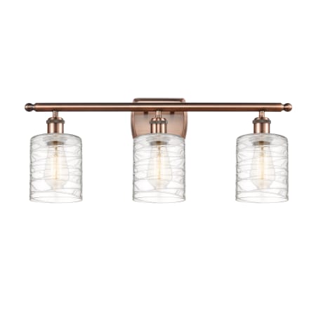 A large image of the Innovations Lighting 516-3W-10-26 Cobbleskill Vanity Antique Copper / Deco Swirl