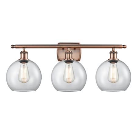 A large image of the Innovations Lighting 516-3W-13-26 Athens Vanity Antique Copper / Clear