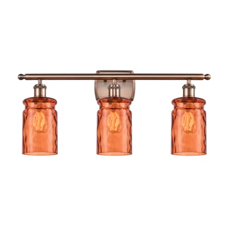 A large image of the Innovations Lighting 516-3W Candor Antique Copper / Turmeric Waterglass