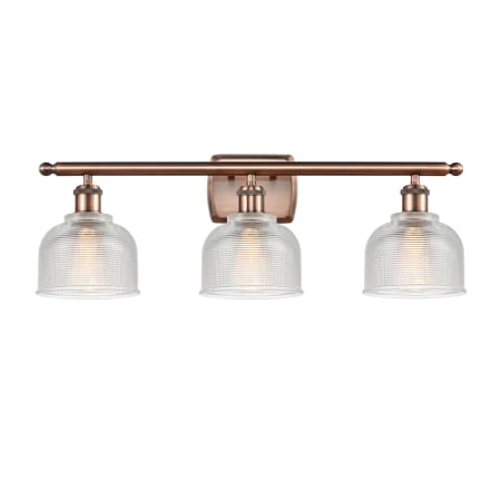 A large image of the Innovations Lighting 516-3W Dayton Antique Copper / Clear