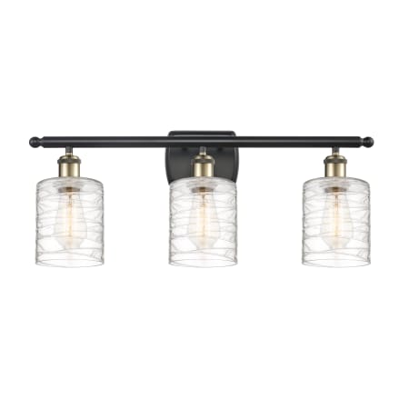 A large image of the Innovations Lighting 516-3W-10-26 Cobbleskill Vanity Black Antique Brass / Deco Swirl