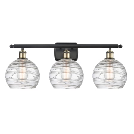 A large image of the Innovations Lighting 516-3W Deco Swirl Black Antique Brass / Clear
