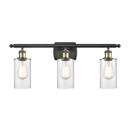 A large image of the Innovations Lighting 516-3W-12-26 Clymer Vanity Clear / Black Antique Brass