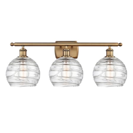 A large image of the Innovations Lighting 516-3W Deco Swirl Brushed Brass / Clear