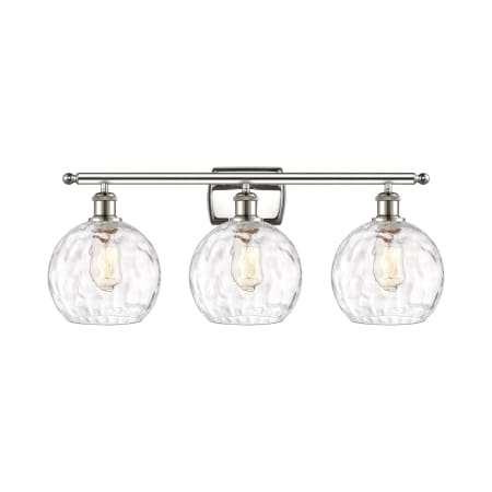 A large image of the Innovations Lighting 516-3W-13-26 Athens Vanity Polished Nickel / Clear Water Glass