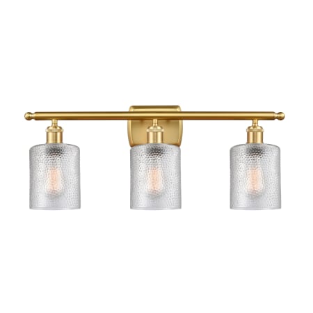 A large image of the Innovations Lighting 516-3W-10-26 Cobbleskill Vanity Clear / Satin Gold