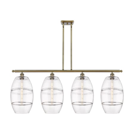 A large image of the Innovations Lighting 516-4I-19-48 Vaz Linear Antique Brass / Clear