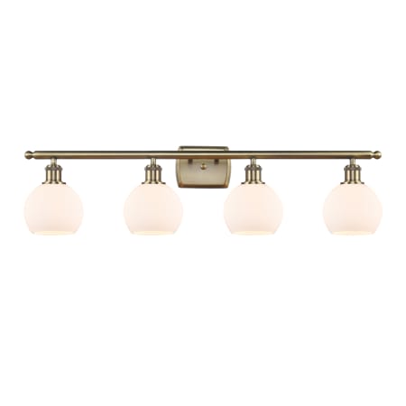 A large image of the Innovations Lighting 516-4W-10-36 Athens Vanity Antique Brass / Matte White