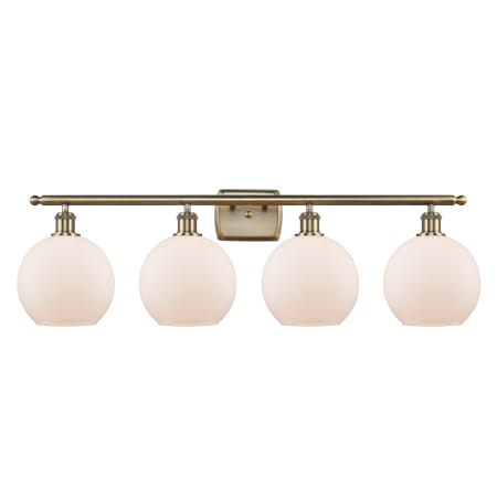 A large image of the Innovations Lighting 516-4W-11-36 Athens Vanity Antique Brass / Matte White