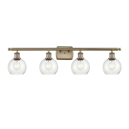 A large image of the Innovations Lighting 516-4W-10-36 Athens Vanity Antique Brass / Seedy