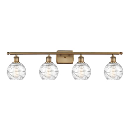 A large image of the Innovations Lighting 516-4W Small Deco Swirl Brushed Brass / Clear