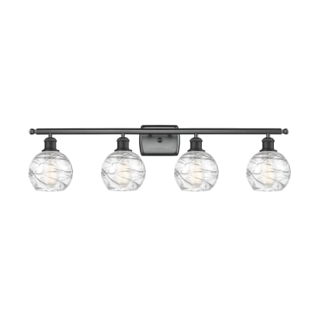 A large image of the Innovations Lighting 516-4W Small Deco Swirl Matte Black / Clear