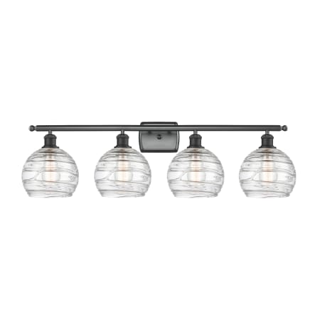 A large image of the Innovations Lighting 516-4W Deco Swirl Matte Black / Clear