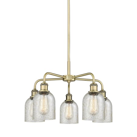 A large image of the Innovations Lighting 516-5CR-15-23 Caledonia Chandelier Antique Brass / Mica