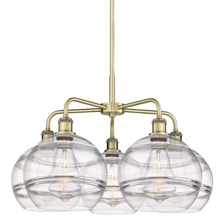 A large image of the Innovations Lighting 516-5CR-18-28 Rochester Chandelier Antique Brass / Clear