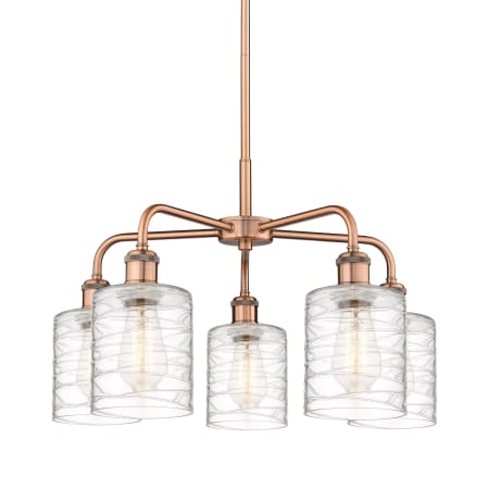 A large image of the Innovations Lighting 516-5CR-15-23 Cobbleskill Chandelier Antique Copper / Deco Swirl