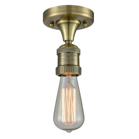 A large image of the Innovations Lighting 517-1C Bare Bulb Antique Brass