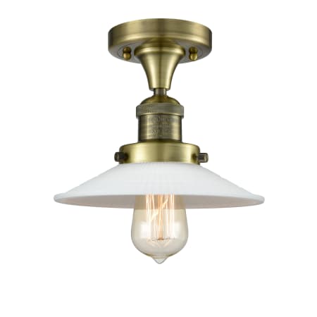 A large image of the Innovations Lighting 517-1CH Halophane Antique Brass / Matte White